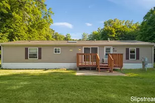 5705 E Riverside Dr, Lyons, MI 48851 - Photo 1