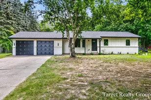 11648 Woodgate Dr NW, Grand Rapids, MI 49534 - Photo 1