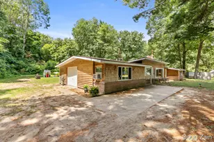 12502 McMurty Dr NE, Sand Lake, MI 49343 - Photo 1