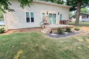 159 E Oak St NE, Sand Lake, MI 49343 - Photo 1