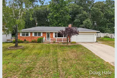 1674 Bonneville Drive, Norton Shores, MI 49441 - Photo 1