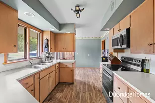 311 Honey Creek Ave SE, Ada, MI 49301 - Photo 8