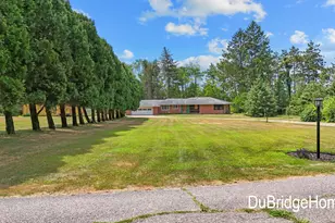 311 Honey Creek Ave SE, Ada, MI 49301 - Photo 1