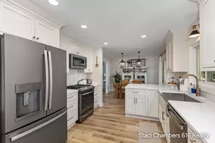 6129 Meadowlark St NE, Rockford, MI 49341 - Photo 8