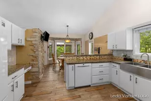 9520 Hidden Bluff Dr NE, Rockford, MI 49341 - Photo 12