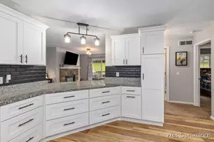 469 Country Meadows Dr NE, Comstock Park, MI 49321 - Photo 14
