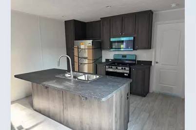 4747 W River Drive NE #Lot 56, Comstock Park, MI 49321 - Photo 6