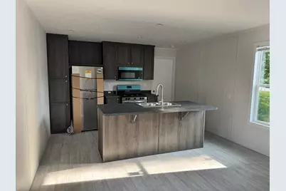 4747 W River Drive NE #Lot 56, Comstock Park, MI 49321 - Photo 4