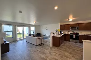 2849 Jordan River Dr, Fowlerville, MI 48836 - Photo 2