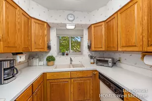 1410 Woodcliff Dr SE, East Grand Rapids, MI 49506 - Photo 20