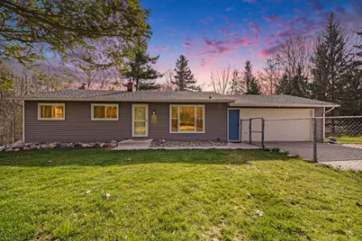 5605 Rockbluff Drive NE, Comstock Park, MI 49321 - Photo 1