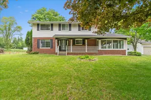 360 Woodcreek Dr, Howell, MI 48843 - Photo 1