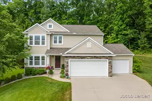 9231 Trafalgar Dr SE, Alto, MI 49302 - Photo 1