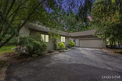 6636 E Riverwoods Court NE, Rockford, MI 49341 - Photo 1