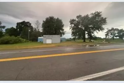 11989 N Six Lakes Road, Six Lakes, MI 48886 - Photo 1