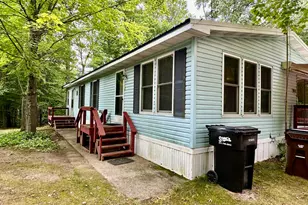 8142 S Saddler Rd, Chase, MI 49623 - Photo 1