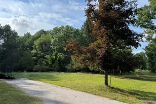 9731 N Bass Lake Rd, Irons, MI 49644 - Photo 1