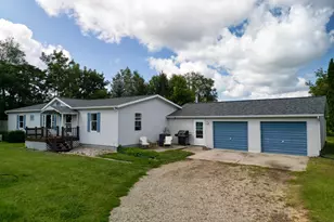 9019 Musson Rd, Six Lakes, MI 48886 - Photo 1