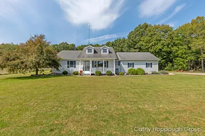 7731 Musson Road, Six Lakes, MI 48886 - Photo 1