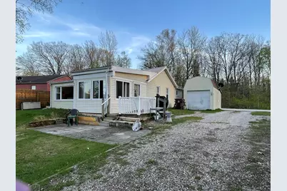 761 S Coolidge Drive, Six Lakes, MI 48886 - Photo 1