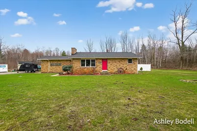 825 16 Mile Road NW, Kent City, MI 49330 - Photo 1