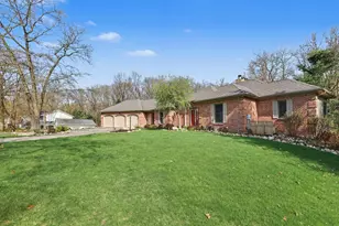 2864 Riverwoods Dr NE, Rockford, MI 49341 - Photo 1
