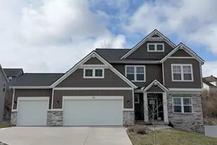 219 Glenbrook Ct NE, Rockford, MI 49341 - Photo 1