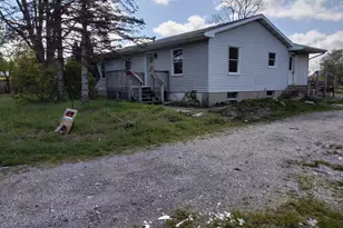 608 10 Mile Rd NW, Sparta, MI 49345 - Photo 1