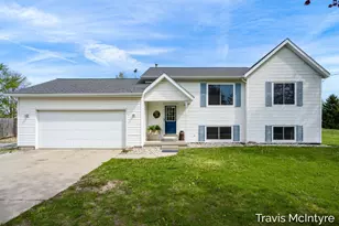 75 Cleveland St E, Coopersville, MI 49404 - Photo 1