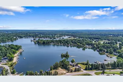 9780 Alamo Court, Canadian Lakes, MI 49346 - Photo 1