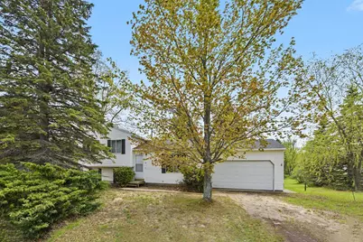 3880 Whispering Oaks Drive, Traverse City, MI 49696 - Photo 1