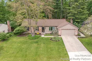 485 Edgeworthe Dr SE, Ada, MI 49301 - Photo 1