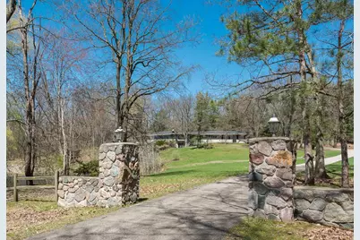 7701 Conservation Street NE, Ada, MI 49301 - Photo 1