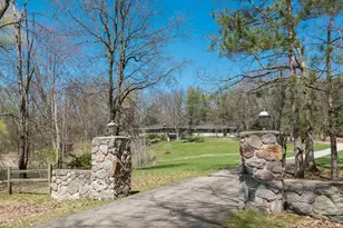 7701 Conservation St NE, Ada, MI 49301 - Photo 1