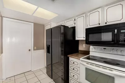 12832 W Peach Blossom Drive, Sun City West, AZ 85375 - Photo 24