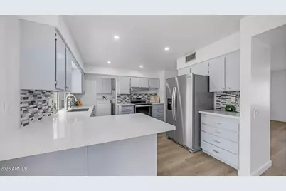 9911 W Pleasant Valley Road, Sun City, AZ 85351 - Photo 1