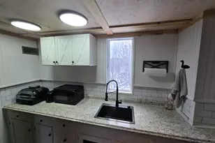 224 Sewall St, Island Falls, ME 04747 - Photo 14
