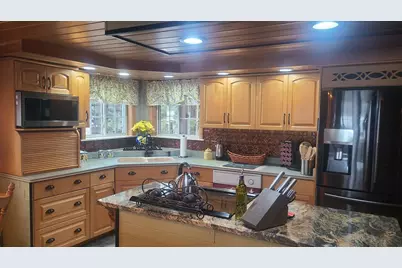 358 Seven Islands Road, Scopan Twp, ME 04757 - Photo 12