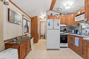 1446 Paleo Woods Way, Casco, ME 04015 - Photo 14