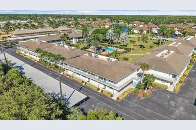 325 Charlemagne Boulevard #103B, Naples, FL 34112 - Photo 1