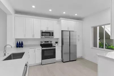 700 Saratoga Circle #B-101, Naples, FL 34104 - Photo 1