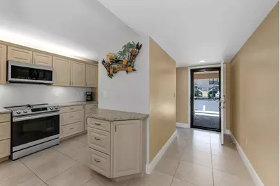 236 Pebble Beach Circle #A102, Naples, FL 34113 - Photo 12