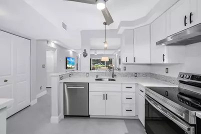 3055 Riviera Drive #102, Naples, FL 34103 - Photo 12