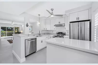3055 Riviera Drive #102, Naples, FL 34103 - Photo 2