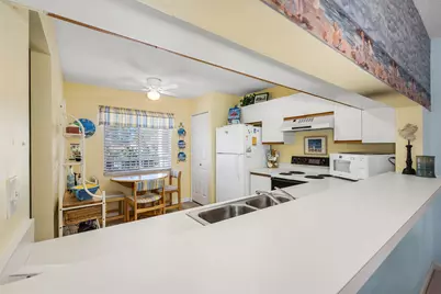 7025 Dennis #202, Naples, FL 34104 - Photo 6