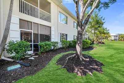 1360 Sweetwater Cove #102, Naples, FL 34110 - Photo 2