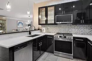 8687 Genova Ct, Naples, FL 34114 - Photo 12