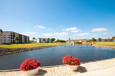 49 High Point Circle S #102, Naples, FL 34103 - Photo 1
