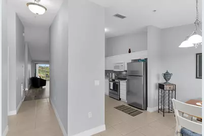 1100 Eastham Way #A302, Naples, FL 34104 - Photo 2