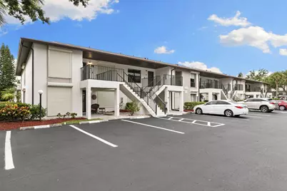 236 Pebble Beach Circle #A202, Naples, FL 34113 - Photo 1